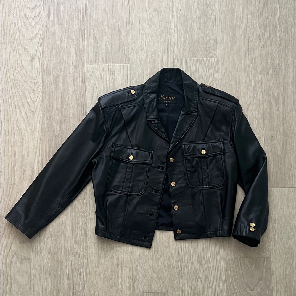 Vintage Black Leather Jacket from 1980’s with shoulder pads.